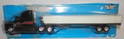 Ertl 1:64 Farm Country Ford Conventional Cab with Stakeside Trailer #4249 NIP - Image 1 of 2