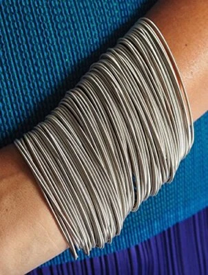 BRACCIALE A MOLLA ELASTICO IN ACCIAIO SET COMPOSTO DA 12 MOLLE - Immagine 1 di 3