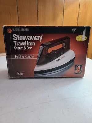 Plancha de viaje Black & Decker Stowaway vapor y mango plegable de doble voltaje seco Foto 1 de 4