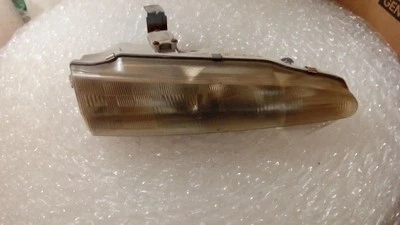 Faro derecho pasajero compatible con 92-94 LASER 10369 Foto 1 de 4