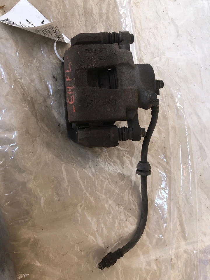 Chevrolet Aveo 2004-2011 sedán 1,6 L pinza de freno delantera izquierda lado del conductor izquierda izquierda Foto 1 de 4