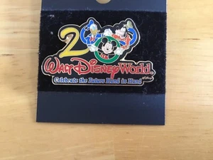 WALT DISNEY WORLD 2000 LAPEL PIN "CELEBRATE THE FUTURE HAND IN HAND" NEW - Picture 1 of 3