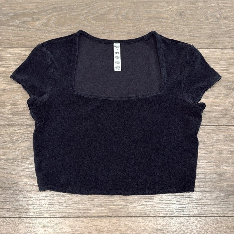 Camiseta corta de manga corta de tela de felpa negra junto a la playa ALO YOGA talla S Foto 1 de 4