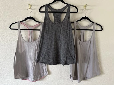 Lote de 3 Tanques Lululemon Gris Ligero Espalda Corredora SIN ETIQUETAS Medida Talla Pequeña Foto 1 de 4