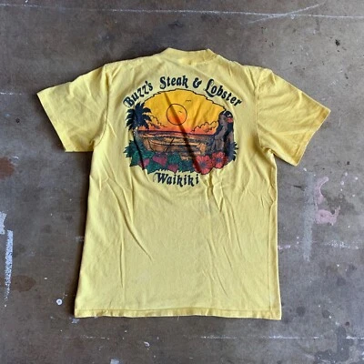 Camiseta vintage anos 70 buzz's steak & lagosta restaurante waikiki havaí tamanho p - Imagem 1 de 4