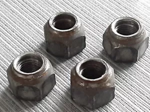 2014-2018 NISSAN VERSA NOTE LEAF NV 200 ROGUE STEEL WHEEL LUG NUTS SET OF 4 OEM* - Picture 1 of 4