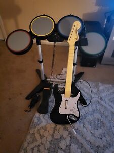 Rock Band Playstation 3 Drums and Guitar Instrument Bundle W/ Dongle