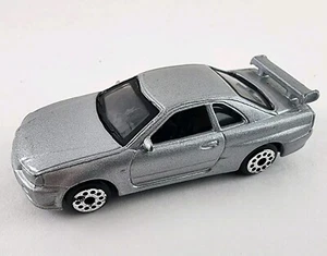 2000's Silver Motor Max Nissan Skyline GT-R Scale 1/64 No. 6028 Diecast Toy Car - Picture 1 of 5