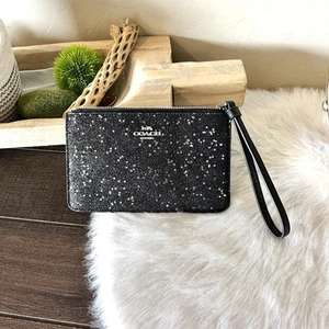Muñequera Coach Black Star Glitter (nunca usada) - Imagen 1 de 3