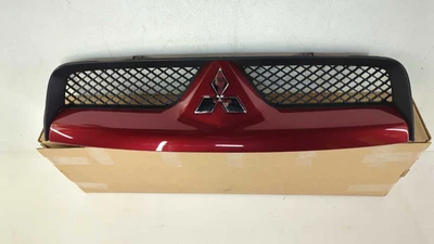 New OEM Genuine Mitsubishi Front Grille 2006-2009 Raider Inferno Red 5JT00ARJAF  - Image 1 of 4