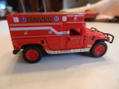 HUMMER H1 RESCUE -  ATLANTIC BEACH - JOHNNY LIGHTNING -  1:64 - Image 1 of 4
