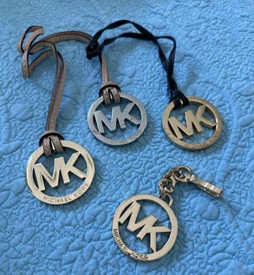 批量 4 件 Michael Kors 镀金和银皮革钱包 Fob Hang 标签 — 第 1/4 张图片