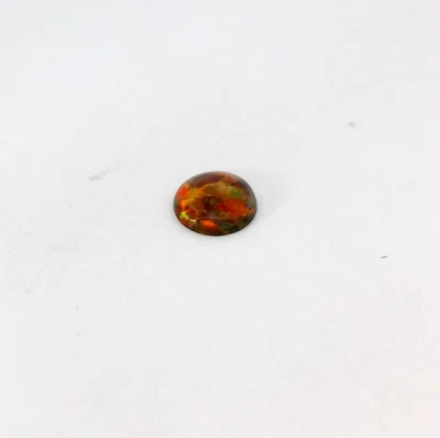Opala tripla 0,17 ct solta criada em laboratório corte redondo laranja/vermelho 5 x 5 mm - Imagem 1 de 2