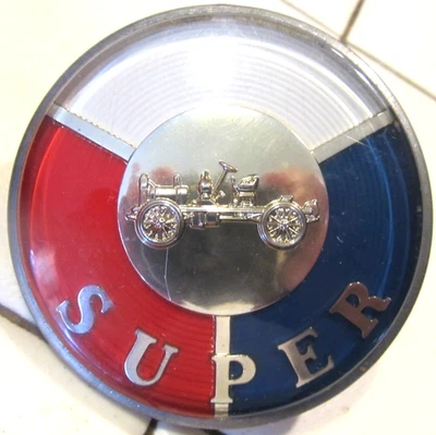 Buick Super 1953 emblema parachoques delantero 1161712 sin usar, en caja embalaje original Foto 1 de 4