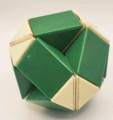 80s Green Cream Snake Puzzle • Magic Twist Fidget • Retro Shape Shifter - Image 1 of 3