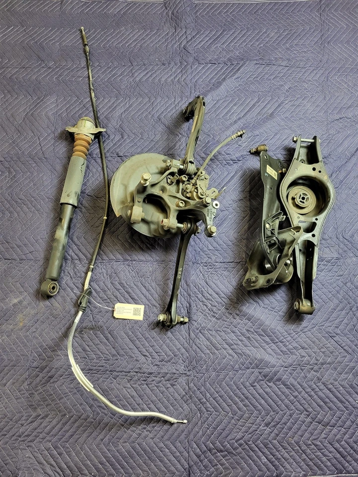 Used Oem Volkswagen Left Driver Rear Suspension Knee 2020-2022 Passat 2.0L FWD - Image 1 of 4