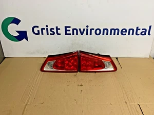 Par de luces de puerta trasera lado conductor y pasajero Lexus IS220D (Z4) - Imagen 1 de 20