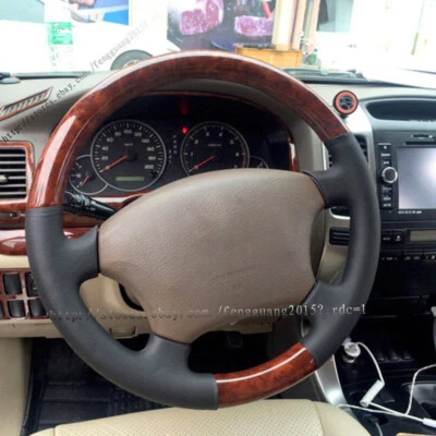 Cubierta decorativa volante toyota land cruiser prado fj120 2003-2009 Foto 1 de 3