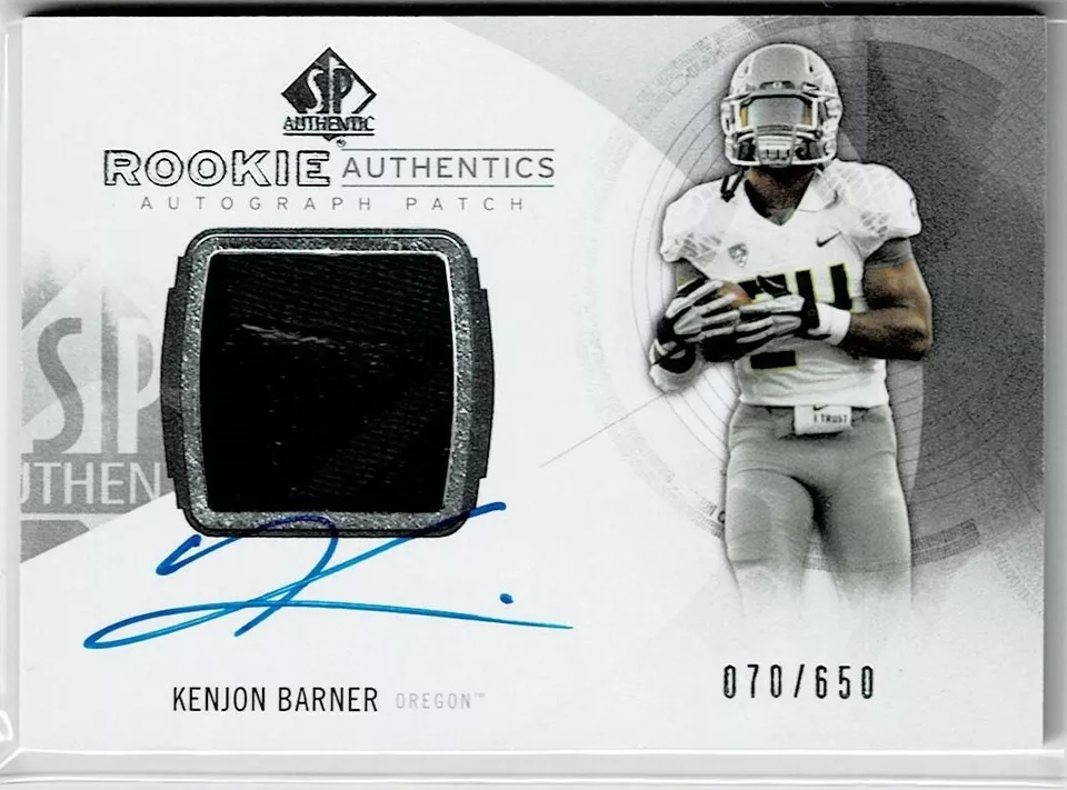Kenjon Barner 2013 SP Authentic Rookie Authentics JSY AU #174 70/650 Bucs - Image 1 of 1