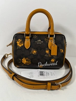 Bolso Bandolera Coach Mini Rowan Nuevo con Etiquetas Firma Lona Floral CCF31 Nogal/Amarillo Foto 1 de 4