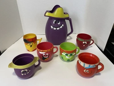 Jarra de uva vintage Pillsbury Kool-Aid cara divertida Goofy COLECCIONABLE y 6 tazas Foto 1 de 4