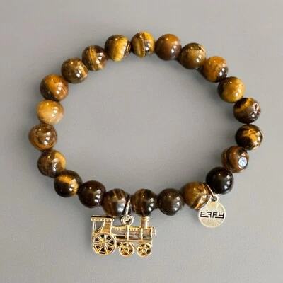 Berloque de trem Effy Tigers olho pedra pulseira elástica frisada novo na bolsa - Imagem 1 de 4