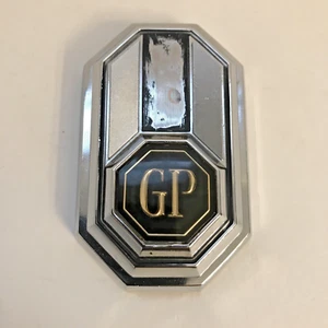 Pontiac Gran Prix Grand GP 1978-84 nuevo emblema de bloqueo de maletero GM 20057103 20057102 - Imagen 1 de 24