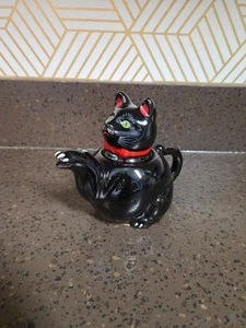 Teiera smaltata vintage anni '50 Shafford Redware gatto nero con fiocco rosso - Foto 1 di 7