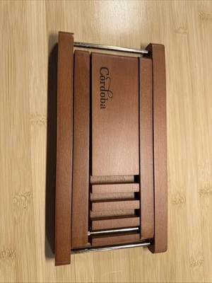 TABURETE PIE GUITARRA PLEGABLE CORDOBA reposapiés reposapiés Foto 1 de 4