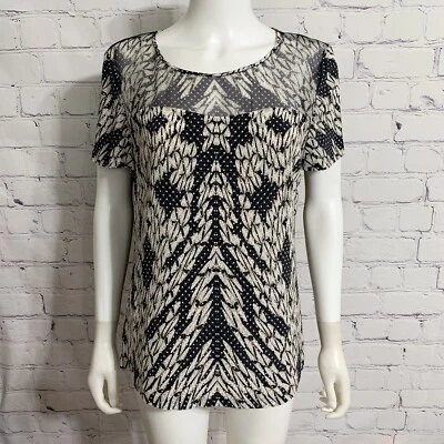 Blusa para mujer DVF Diane Von Furstenberg 12 negra pantera encaje acento transparente nueva Foto 1 de 4