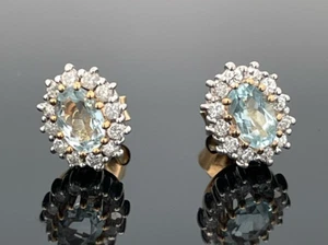 SCHMUCKJAGD OHRSTECKER AUS 585/-GELBGOLD MIT BLAUTOPAS & ZIRKON - Bild 1 von 3