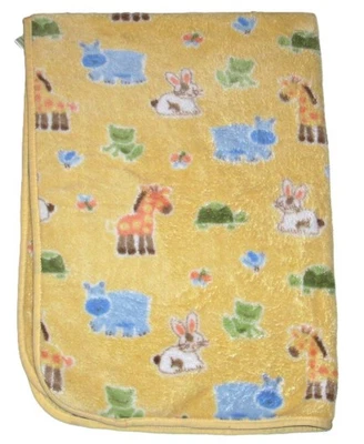 Manta bebé Circo Target amarilla conejito tortuga jirafa hipopótamo rana felpa seguridad Foto 1 de 2