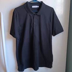Camisa Para Hombres Calvin Klein Manga Corta Negra Cuello 3 Botones Negra Talla Grande C29 - Imagen 1 de 5