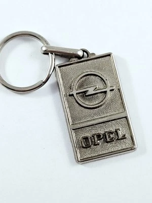 PORTE-CLES - OPEL 1990s Métal - Garages - Astra Corsa Vectra Omega Calibra Tigra - Photo 1/2