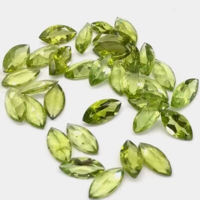 Оптовый лот из 10x5 мм натуральных калиброванных драгоценных камней перидот огранки маркиза россыпью - Изображение 1 из 4