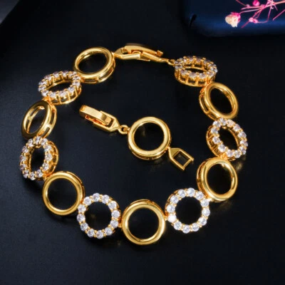 Pulseras de concurso nupcial huecas redondas de circonita cúbica de oro de 18 quilates de lujo de moda Foto 1 de 4