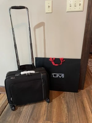NEW Tumi ARRIVE 17.5” Compact 4 Wheeled Briefcase - BLACK  -$1,495.00 - Image 1 of 4