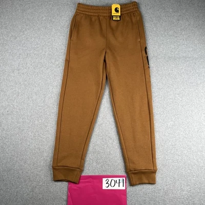 Pantalones deportivos Carhartt jóvenes niños medianos marrón polar estampado gráfico informales nuevos con etiquetas Foto 1 de 4