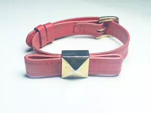 KATE SPADE LOCKED IN RED LEATHER BRACELET BUCKLE BOW BANGLE GOLD PLATED ACCENT - Picture 1 of 4