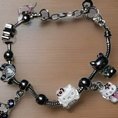Pulsera 7 Dijes HELLO KITTY Acero Inoxidable 7" Ajustable, Foto 1 de 4
