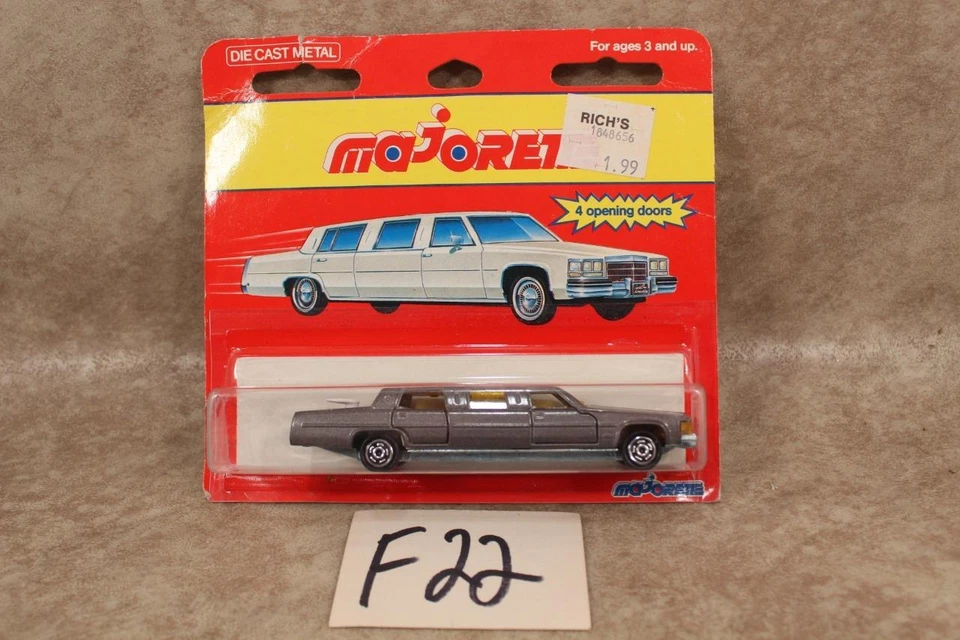 F22 VINTAGE MAJORETTE CADILLAC STRETCH LIMOUSINE 300 SERIES CAR ON CARD - Image 1 of 1