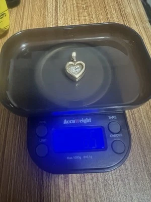 RARO Colgante Oro Amarillo 14k Diamante Corazón Chips 6.5 g. En muy buen estado No es Chatarra $77/g. Foto 1 de 4