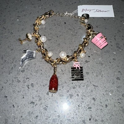 Betsey Johnson Gold Tone Going Out Charm Bracelet Woven Chain Accent NWT - Image 1 of 4