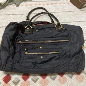 Bolso Tods de nailon negro con cremallera dorada - Imagen 1 de 8