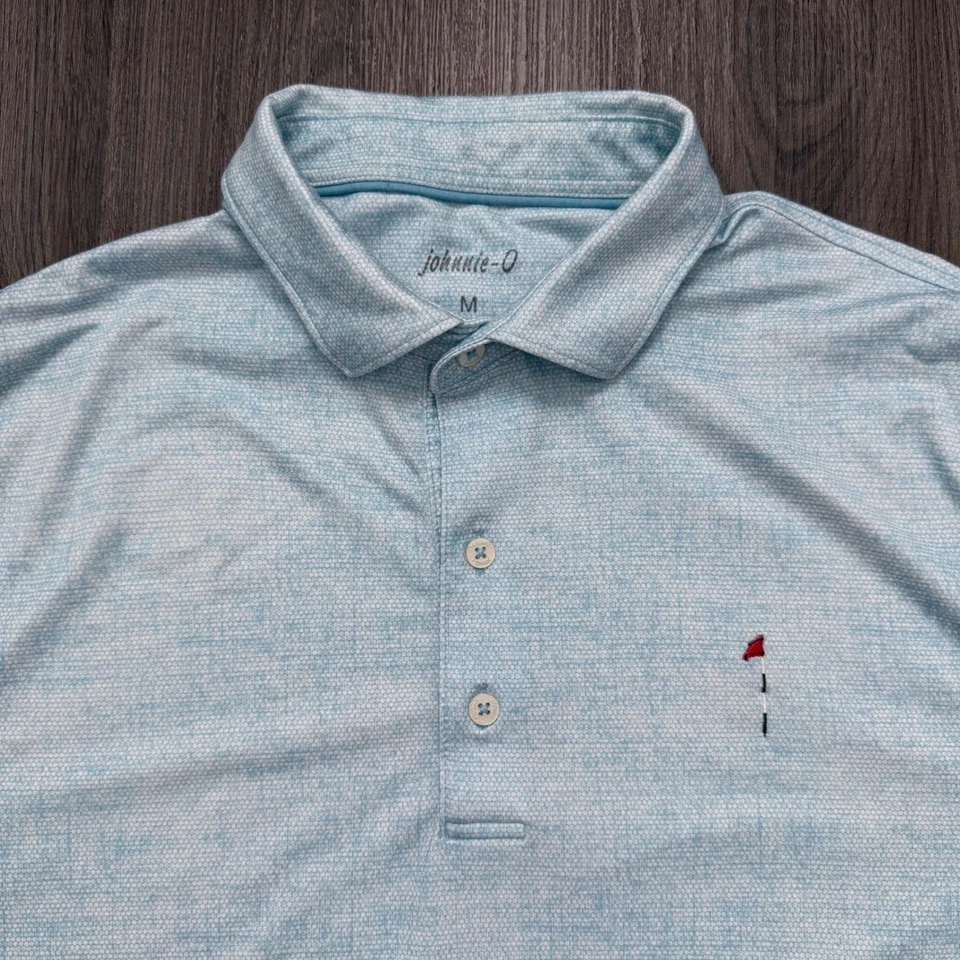 Camisa Polo Johnnie-O Para Hombres M Azul Claro Rendimiento Golf Informal Protección Solar Foto 1 de 4