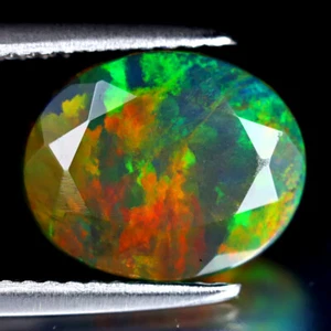 2.53 ct Romantic Oval (11 x 9 mm) Flashing 360 Degree Multicolor Black Opal - Picture 1 of 2