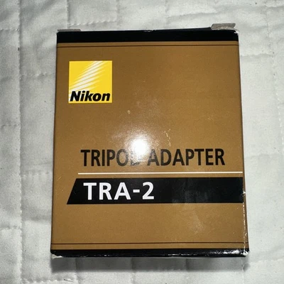 Adaptador de trípode Nikon TRA-2 para acción / Aculon / Action EX / binoculares marinos Foto 1 de 4