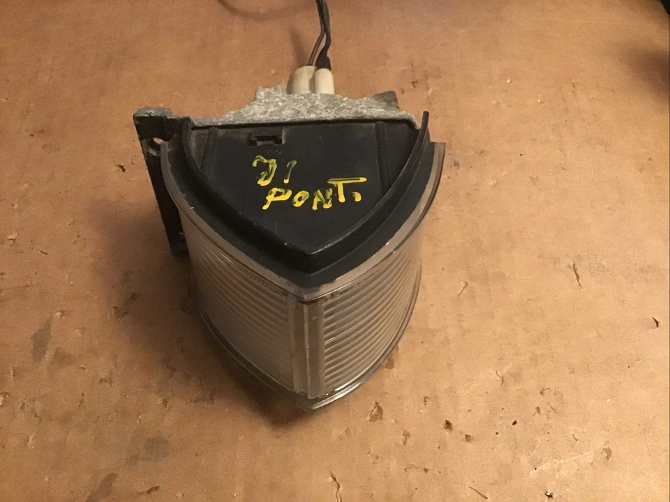 Pontiac Catalina & Bonneville 1971 luz de estacionamiento delantera izquierda OEM Foto 1 de 4