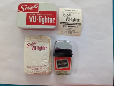 Encendedor VU Scripto vintage CARLING ETIQUETA NEGRA CERVEZA STAG en caja de hojalata original Foto 1 de 4