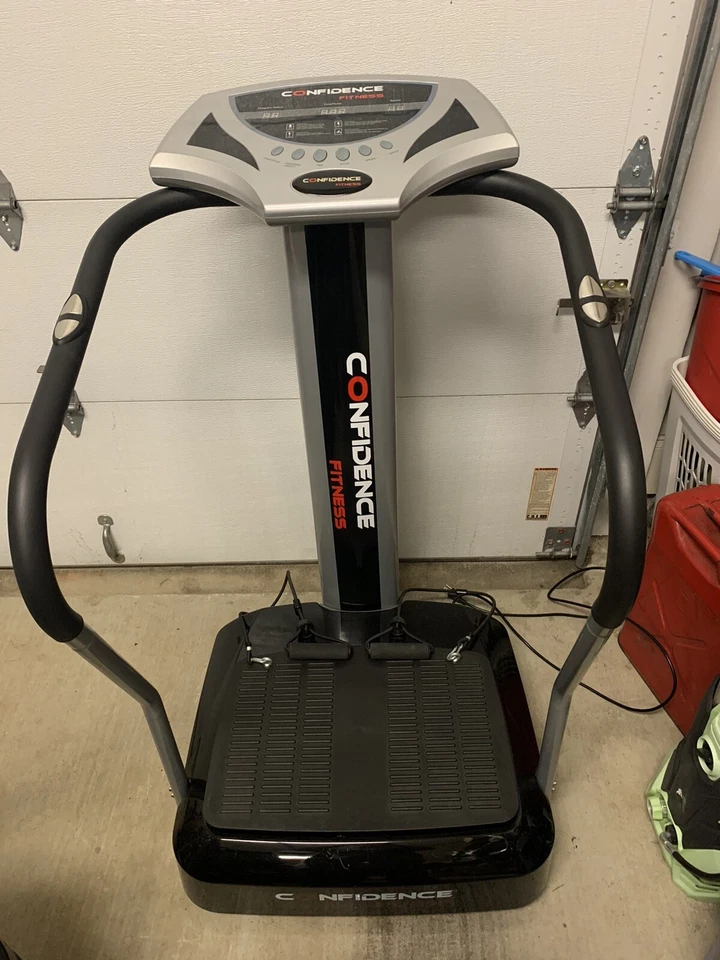 Confidence Fitness Máquina Entrenadora de Placa de Vibración para Todo el Cuerpo con Correas para el Brazo Foto 1 de 4